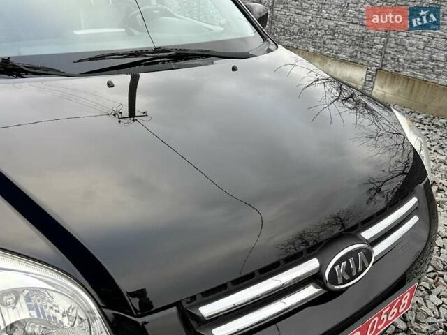 Черный Киа Sportage, объемом двигателя 2 л и пробегом 240 тыс. км за 7650 $, фото 16 на Automoto.ua