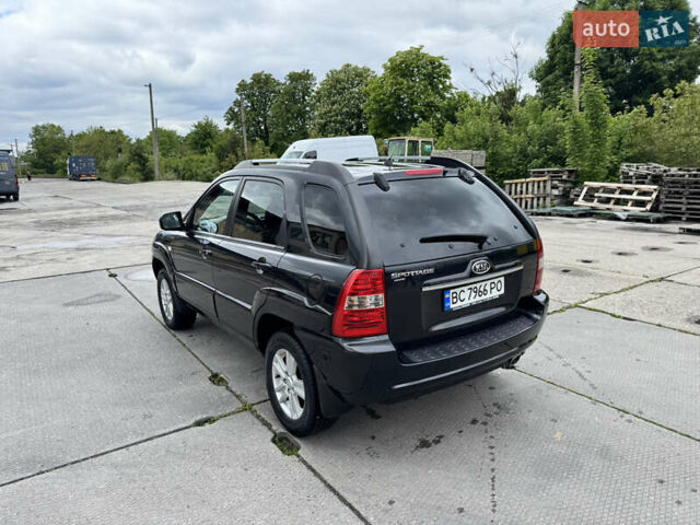 Черный Киа Sportage, объемом двигателя 2 л и пробегом 184 тыс. км за 7999 $, фото 7 на Automoto.ua
