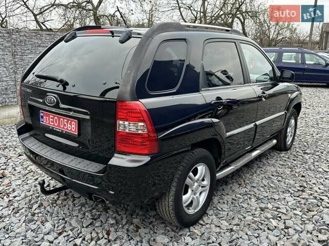 Черный Киа Sportage, объемом двигателя 2 л и пробегом 240 тыс. км за 7650 $, фото 2 на Automoto.ua