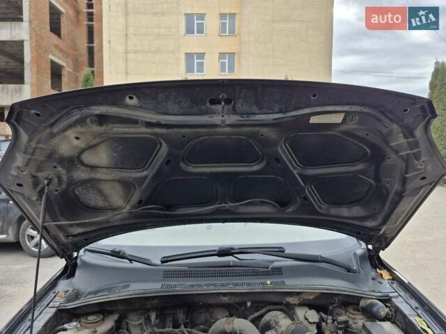 Черный Киа Sportage, объемом двигателя 2 л и пробегом 226 тыс. км за 7500 $, фото 16 на Automoto.ua