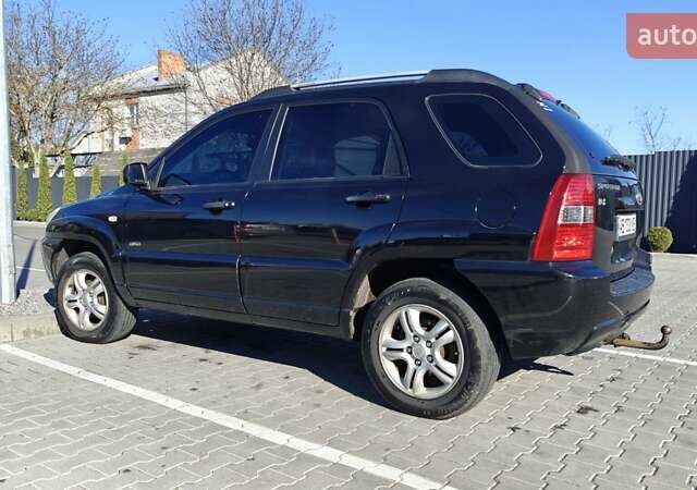 Черный Киа Sportage, объемом двигателя 1.98 л и пробегом 234 тыс. км за 8000 $, фото 2 на Automoto.ua