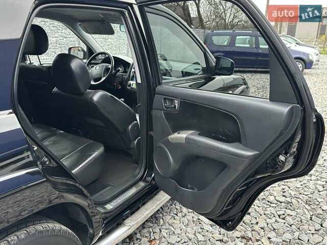 Черный Киа Sportage, объемом двигателя 2 л и пробегом 240 тыс. км за 7650 $, фото 66 на Automoto.ua