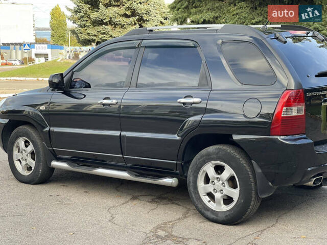Чорний Кіа Sportage, об'ємом двигуна 1.99 л та пробігом 192 тис. км за 9500 $, фото 4 на Automoto.ua