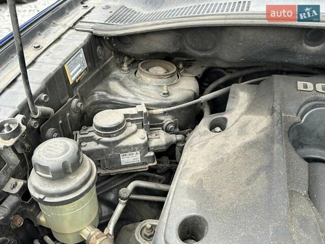 Черный Киа Sportage, объемом двигателя 2 л и пробегом 240 тыс. км за 7650 $, фото 93 на Automoto.ua