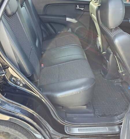 Черный Киа Sportage, объемом двигателя 1.98 л и пробегом 234 тыс. км за 8000 $, фото 22 на Automoto.ua