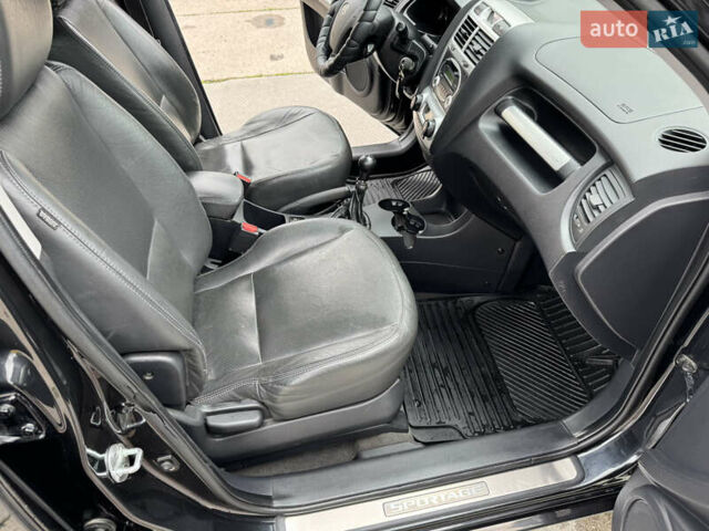 Черный Киа Sportage, объемом двигателя 2 л и пробегом 184 тыс. км за 7999 $, фото 36 на Automoto.ua