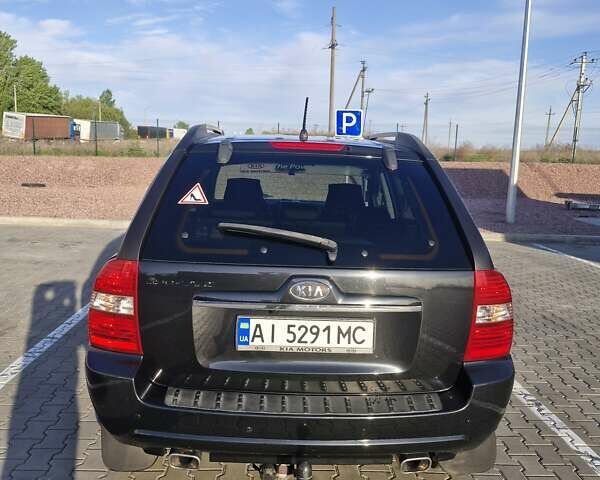 Черный Киа Sportage, объемом двигателя 2 л и пробегом 202 тыс. км за 8300 $, фото 2 на Automoto.ua