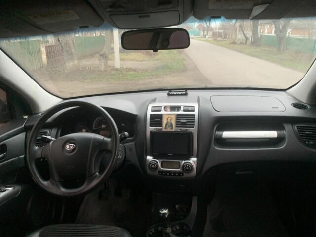 Черный Киа Sportage, объемом двигателя 2 л и пробегом 315 тыс. км за 6900 $, фото 6 на Automoto.ua