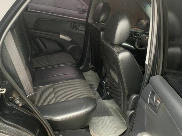 Черный Киа Sportage, объемом двигателя 2 л и пробегом 315 тыс. км за 6900 $, фото 7 на Automoto.ua