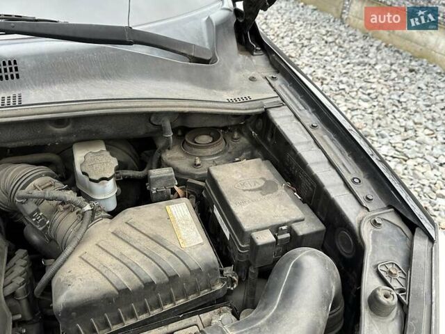 Черный Киа Sportage, объемом двигателя 2 л и пробегом 240 тыс. км за 7650 $, фото 96 на Automoto.ua