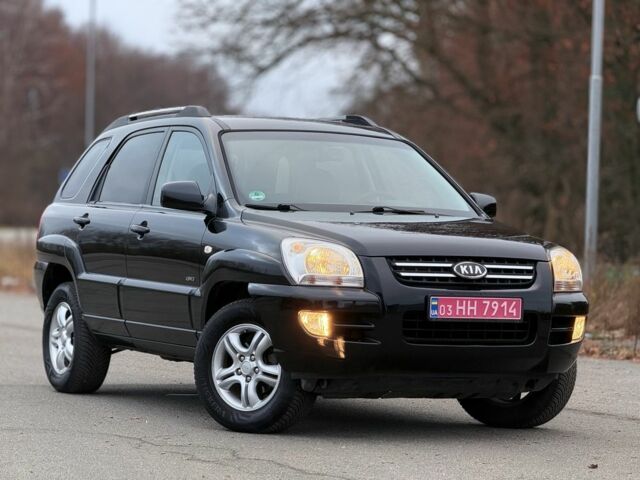 Черный Киа Sportage, объемом двигателя 2 л и пробегом 213 тыс. км за 8600 $, фото 5 на Automoto.ua