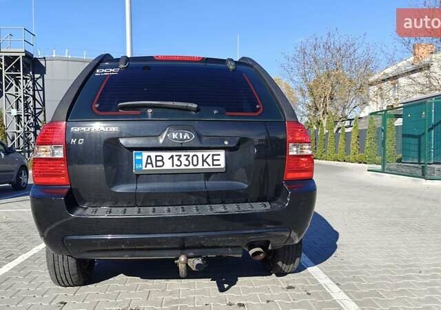 Черный Киа Sportage, объемом двигателя 1.98 л и пробегом 234 тыс. км за 8000 $, фото 3 на Automoto.ua