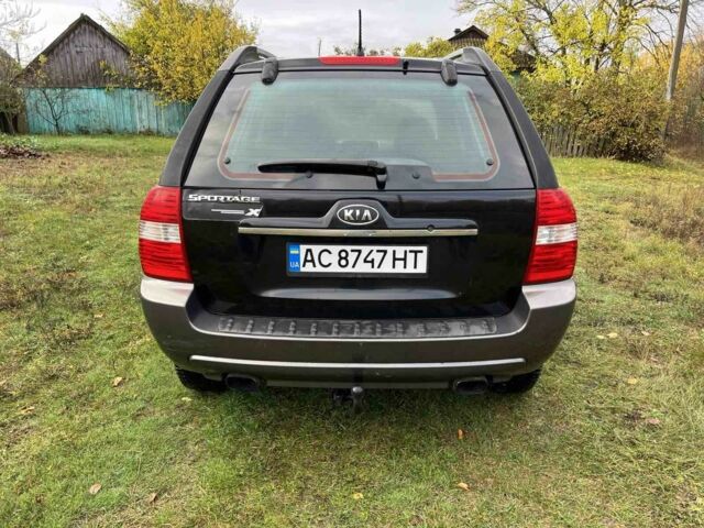 Черный Киа Sportage, объемом двигателя 2 л и пробегом 229 тыс. км за 4600 $, фото 6 на Automoto.ua