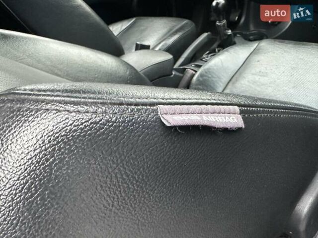 Черный Киа Sportage, объемом двигателя 2 л и пробегом 240 тыс. км за 7650 $, фото 70 на Automoto.ua