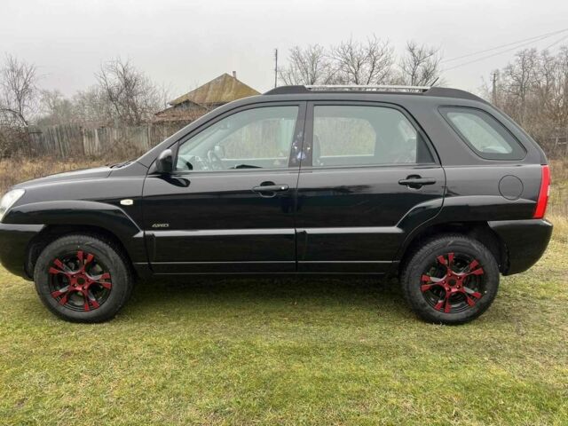 Чорний Кіа Sportage, об'ємом двигуна 2 л та пробігом 237 тис. км за 5100 $, фото 11 на Automoto.ua