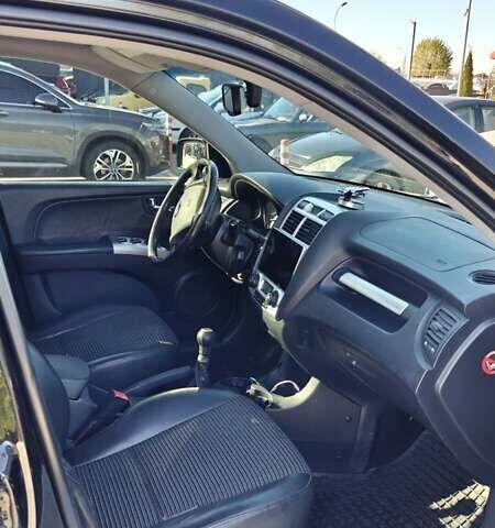 Черный Киа Sportage, объемом двигателя 1.98 л и пробегом 234 тыс. км за 8000 $, фото 12 на Automoto.ua