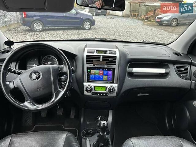 Черный Киа Sportage, объемом двигателя 2 л и пробегом 240 тыс. км за 7650 $, фото 63 на Automoto.ua