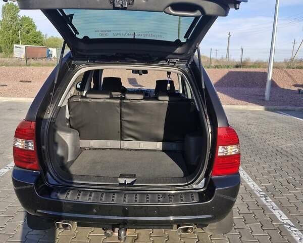 Черный Киа Sportage, объемом двигателя 2 л и пробегом 202 тыс. км за 8300 $, фото 13 на Automoto.ua