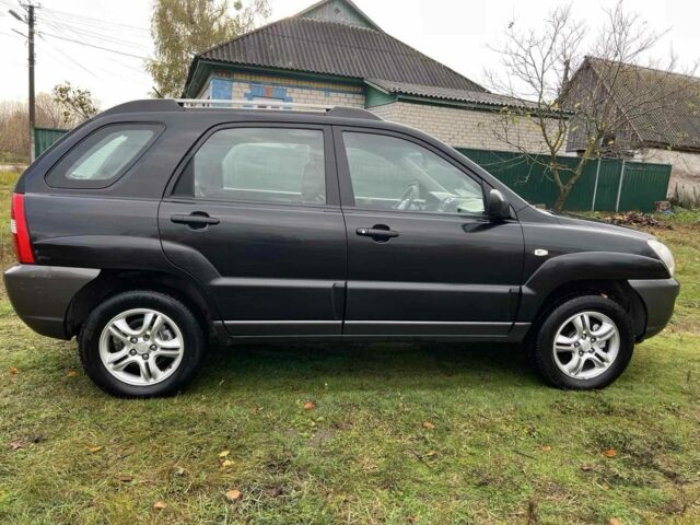 Черный Киа Sportage, объемом двигателя 2 л и пробегом 229 тыс. км за 4600 $, фото 4 на Automoto.ua