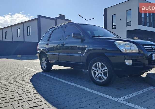 Черный Киа Sportage, объемом двигателя 1.98 л и пробегом 234 тыс. км за 8000 $, фото 10 на Automoto.ua