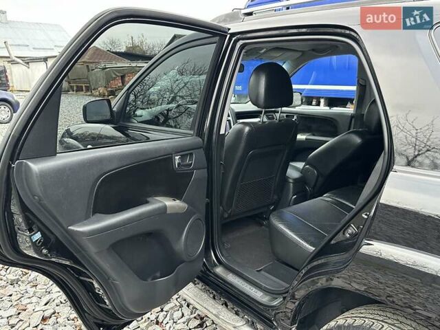 Черный Киа Sportage, объемом двигателя 2 л и пробегом 240 тыс. км за 7650 $, фото 57 на Automoto.ua