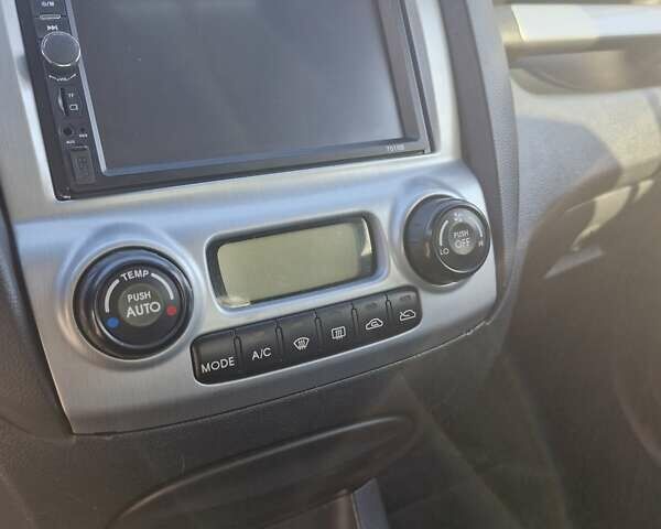 Черный Киа Sportage, объемом двигателя 2 л и пробегом 202 тыс. км за 8300 $, фото 42 на Automoto.ua