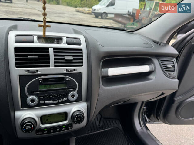 Черный Киа Sportage, объемом двигателя 2 л и пробегом 184 тыс. км за 7999 $, фото 39 на Automoto.ua