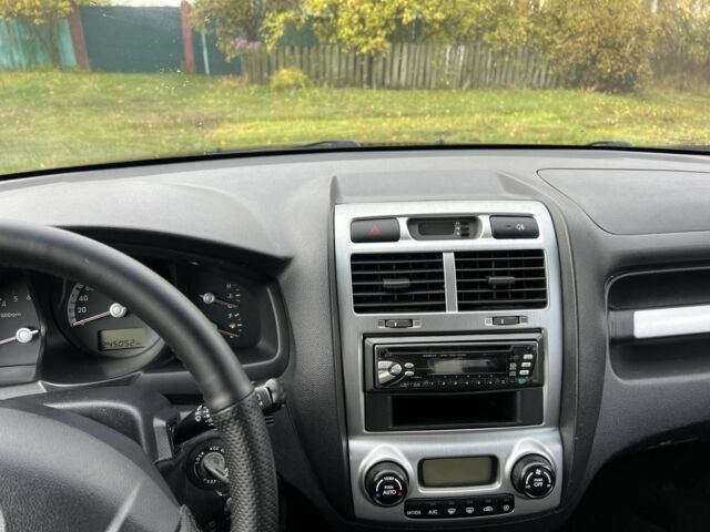 Черный Киа Sportage, объемом двигателя 2 л и пробегом 229 тыс. км за 4600 $, фото 11 на Automoto.ua