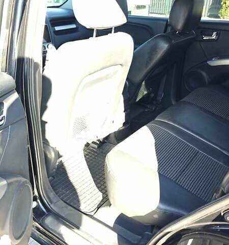 Черный Киа Sportage, объемом двигателя 1.98 л и пробегом 234 тыс. км за 8000 $, фото 16 на Automoto.ua