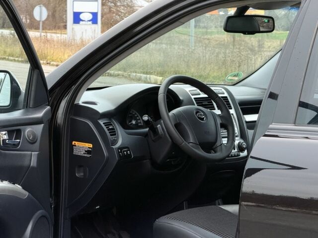 Черный Киа Sportage, объемом двигателя 2 л и пробегом 213 тыс. км за 8600 $, фото 12 на Automoto.ua