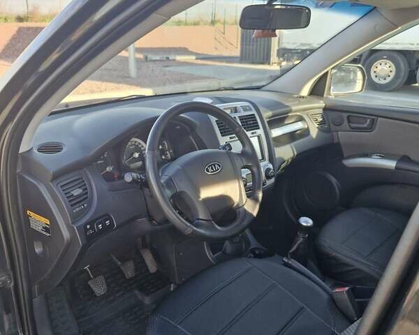 Черный Киа Sportage, объемом двигателя 2 л и пробегом 202 тыс. км за 8300 $, фото 21 на Automoto.ua