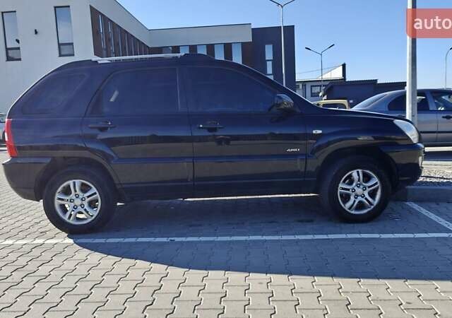 Черный Киа Sportage, объемом двигателя 1.98 л и пробегом 234 тыс. км за 8000 $, фото 1 на Automoto.ua
