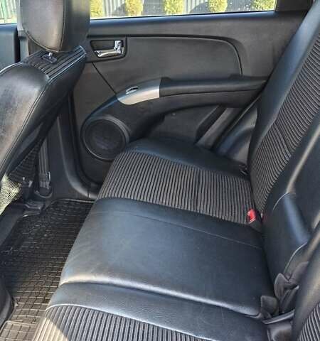 Черный Киа Sportage, объемом двигателя 1.98 л и пробегом 234 тыс. км за 8000 $, фото 21 на Automoto.ua