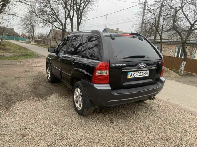 Черный Киа Sportage, объемом двигателя 2 л и пробегом 315 тыс. км за 6900 $, фото 2 на Automoto.ua