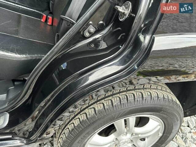 Черный Киа Sportage, объемом двигателя 2 л и пробегом 240 тыс. км за 7650 $, фото 60 на Automoto.ua