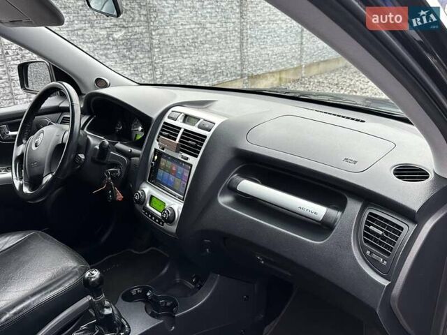 Черный Киа Sportage, объемом двигателя 2 л и пробегом 240 тыс. км за 7650 $, фото 76 на Automoto.ua