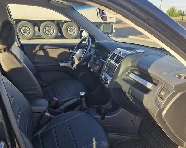 Черный Киа Sportage, объемом двигателя 2 л и пробегом 202 тыс. км за 8300 $, фото 19 на Automoto.ua