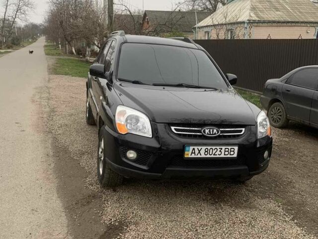 Черный Киа Sportage, объемом двигателя 2 л и пробегом 315 тыс. км за 6900 $, фото 1 на Automoto.ua