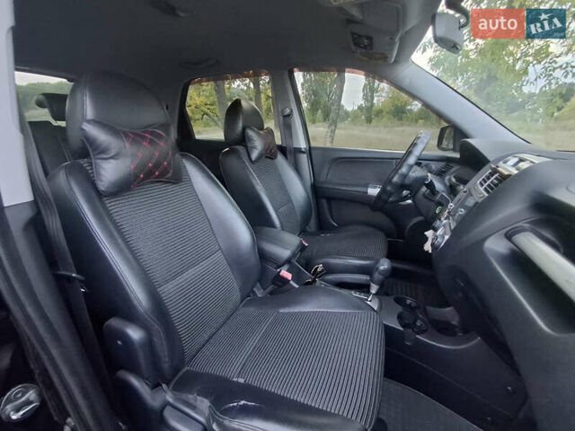Черный Киа Sportage, объемом двигателя 2.7 л и пробегом 261 тыс. км за 8500 $, фото 5 на Automoto.ua