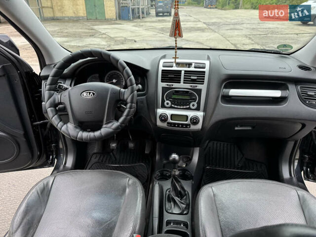 Черный Киа Sportage, объемом двигателя 2 л и пробегом 184 тыс. км за 7999 $, фото 37 на Automoto.ua