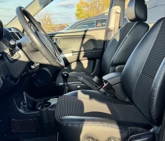 Чорний Кіа Sportage, об'ємом двигуна 2 л та пробігом 178 тис. км за 8800 $, фото 11 на Automoto.ua