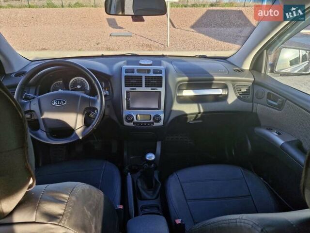 Черный Киа Sportage, объемом двигателя 2 л и пробегом 202 тыс. км за 8300 $, фото 26 на Automoto.ua