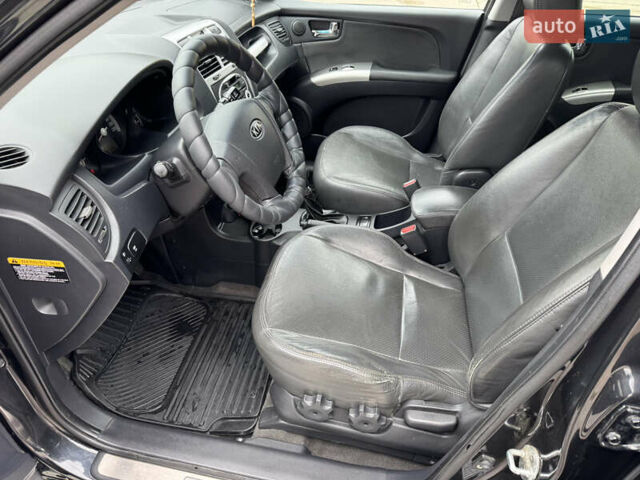 Черный Киа Sportage, объемом двигателя 2 л и пробегом 184 тыс. км за 7999 $, фото 33 на Automoto.ua