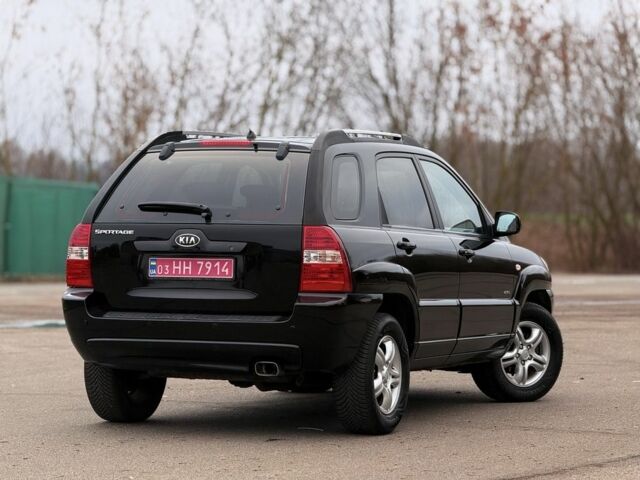 Черный Киа Sportage, объемом двигателя 2 л и пробегом 213 тыс. км за 8600 $, фото 7 на Automoto.ua