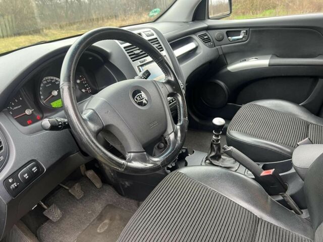 Чорний Кіа Sportage, об'ємом двигуна 2 л та пробігом 237 тис. км за 5100 $, фото 5 на Automoto.ua