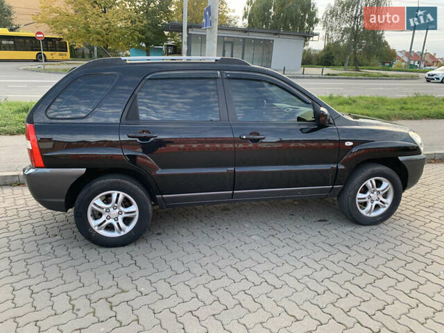 Черный Киа Sportage, объемом двигателя 1.98 л и пробегом 220 тыс. км за 7900 $, фото 8 на Automoto.ua