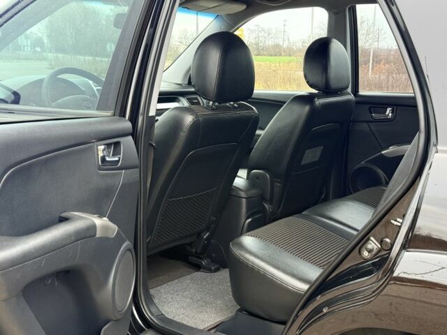 Черный Киа Sportage, объемом двигателя 2 л и пробегом 213 тыс. км за 8600 $, фото 14 на Automoto.ua