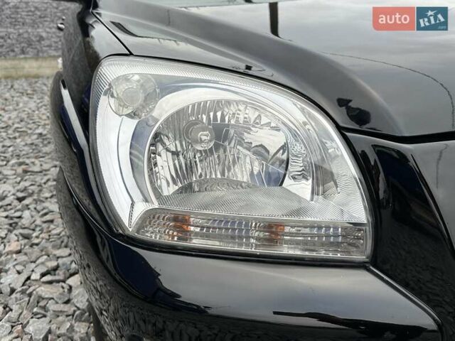 Черный Киа Sportage, объемом двигателя 2 л и пробегом 240 тыс. км за 7650 $, фото 7 на Automoto.ua