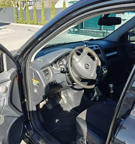 Черный Киа Sportage, объемом двигателя 1.98 л и пробегом 234 тыс. км за 8000 $, фото 15 на Automoto.ua