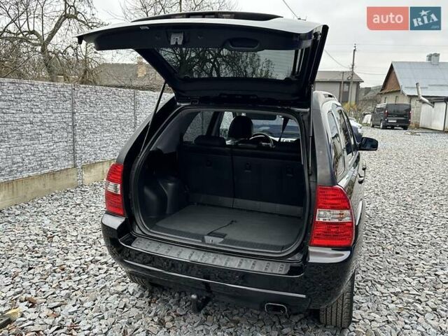Черный Киа Sportage, объемом двигателя 2 л и пробегом 240 тыс. км за 7650 $, фото 82 на Automoto.ua
